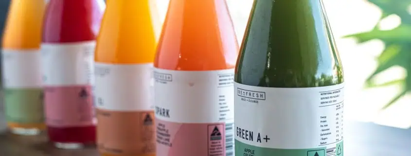 This photo shows bottles of probiotic drinks for gut health