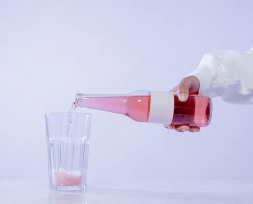 This photo shows a drink for gut health being poured into a glass